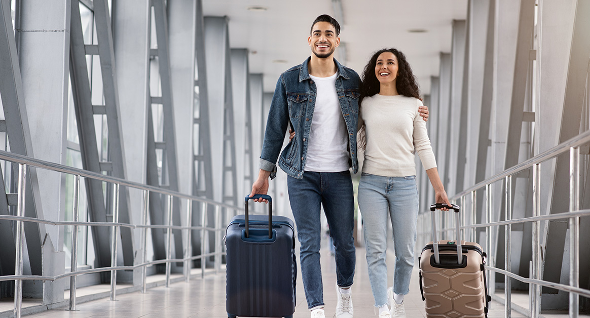 Couple traveling with a migraine at the airport